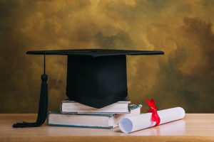 Graduation cap and diploma.